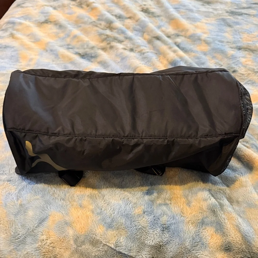 Puma Black Duffel Bag with Gold Puma Logo and Branded Straps